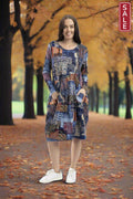 California Dreaming Bubble Dress in autumn setting with long sleeves and pockets, perfect for stylish winter wear.