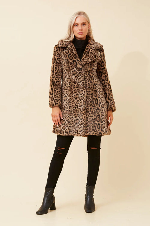 Stylish model wearing an Animal Print coat with lapel collar and pockets against a neutral background.