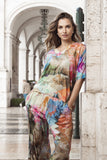 Model wearing Scenic Digital Boxy Top with vibrant patterns in a stylish setting.