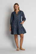 Amarillo Tier Dress showcasing flowing tiered layers and a flattering silhouette in navy floral design.