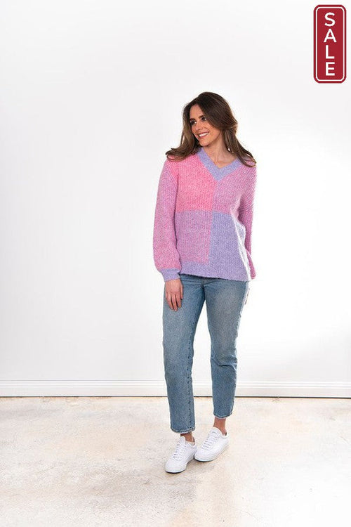 Bella 2 tone Fishermans Jumper in pink and purple worn by a model, showcasing stylish knitwear.