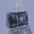 Denim Handwoven Vacation Carry-On with studded stars and silver accents on a stylish design.