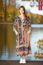 Gisele Midi dress featuring 3/4 sleeves, flared cuffs, and pockets, perfect for any occasion. Made in India.