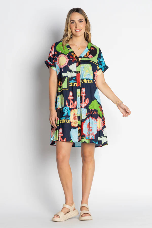 Melrose Dress Navy worn by model, showcasing vibrant digital print and relaxed fit, perfect summer outfit.