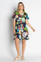 Melrose Dress Navy worn by model, showcasing vibrant digital print and relaxed fit, perfect summer outfit.