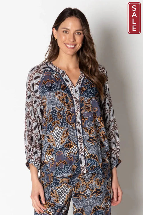 Bilboa Top Multi in stylish print with 3/4 sleeves and button-up front, perfect for a chic and elegant look.