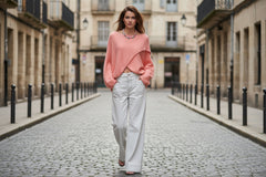 Matilda Cape worn by a model in a chic urban setting, showcasing effortless Italian elegance and style.