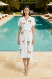 Lulalife Sahara Shirtmaker White, a chic shirt dress with embroidery, perfect for summer by the pool.