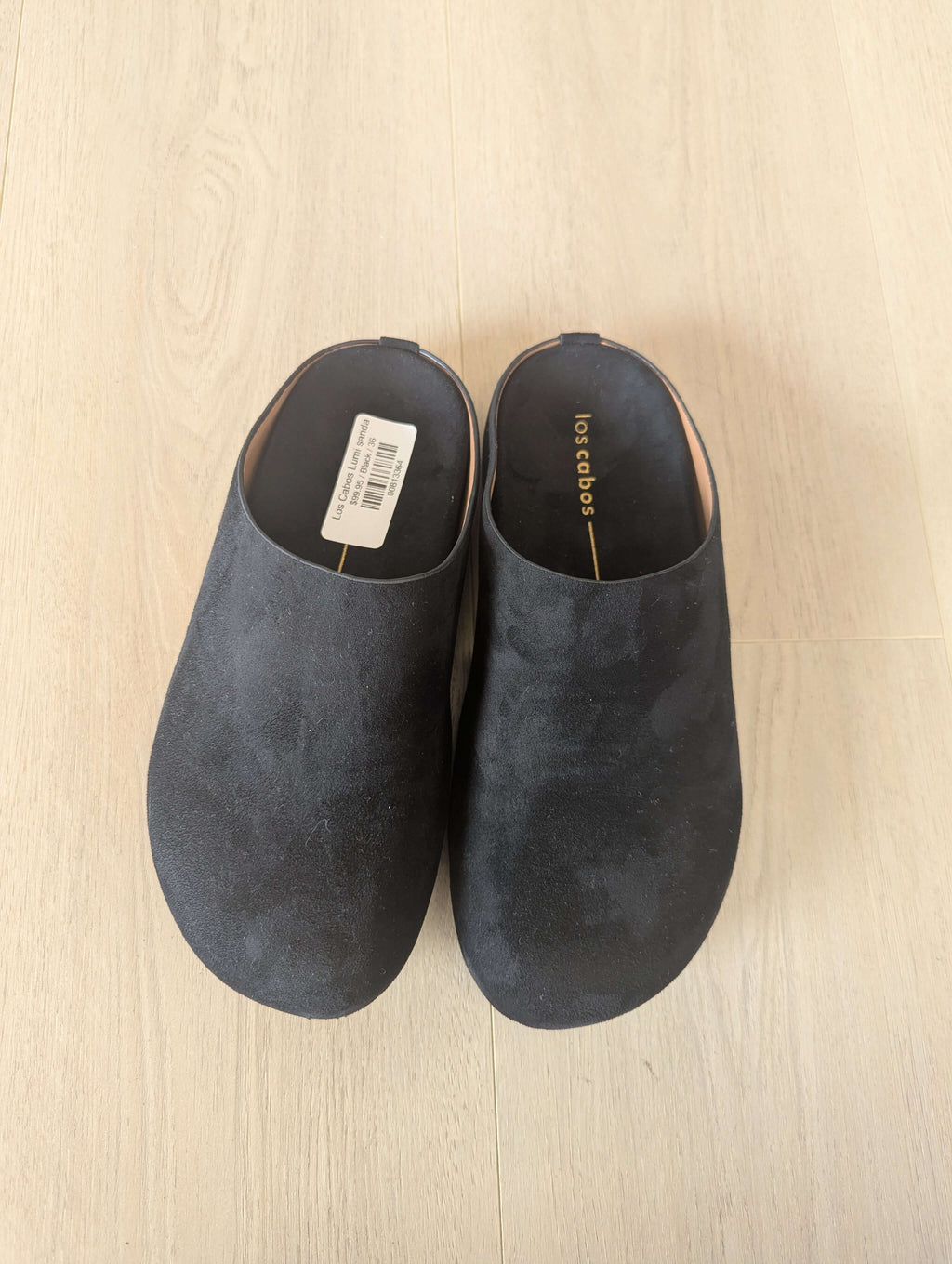 Los Cabos Lumi Slides black synthetic suede slip-on shoes with a comfortable inner sole and stylish design.