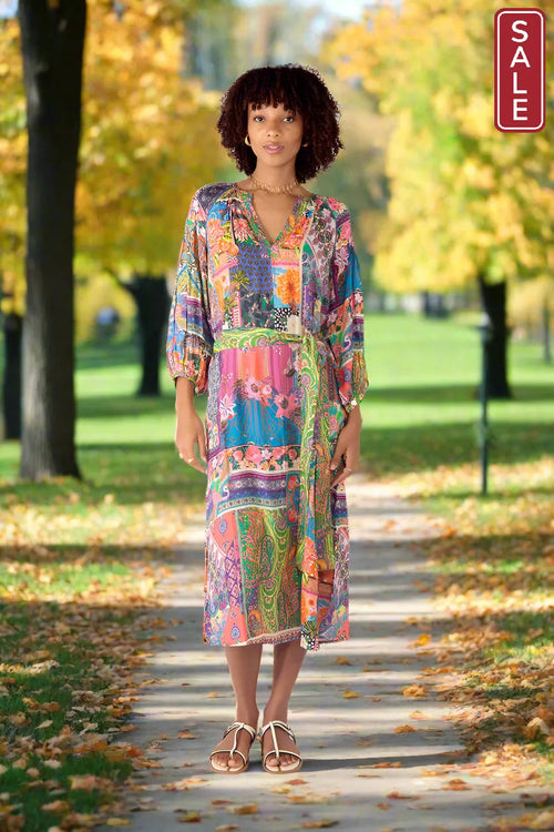 Basilica Maxi Dress in vibrant colors, featuring V-neckline and self-tie belt, perfect for stylish summer days.