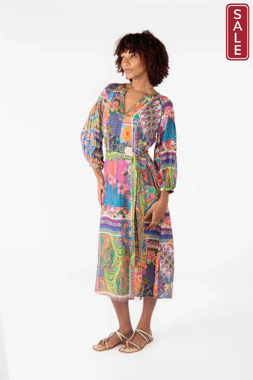 Basilica Maxi Dress in vibrant prints, perfect for a bold summer style with relaxed fit and self-tie belt.