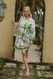 Cest La Vie Shirtmaker White worn with a tropical print, showcasing relaxed charm and style in a serene outdoor setting.
